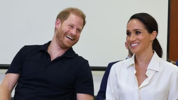 Meghan y Harry bailando salsa