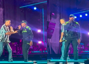 Policía se robó el show cantando “Ella y yo” junto a Romeo Santos durante su presentación en el Atanasio Girardot